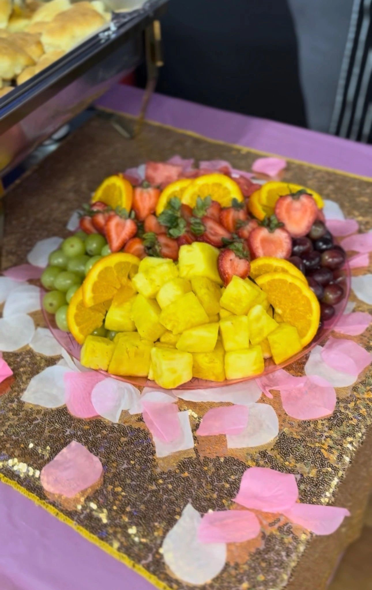 Fruit platter on gold sequined tablecloth